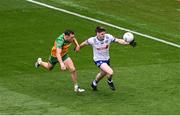 28 June 2025; Stephen O'Hanlon of Monaghan in action against Caolan McColgan of Donegal during the GAA Football All-Ireland Senior Championship quarter-final match between Monaghan and Donegal at Croke Park in Dublin. Photo by Daire Brennan/Sportsfile