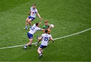 28 June 2025; Ciarán Moore of Donegal in action against Monaghan players, left to right, Conor McCarthy, Ryan Wylie, and Stephen O'Hanlon during the GAA Football All-Ireland Senior Championship quarter-final match between Monaghan and Donegal at Croke Park in Dublin. Photo by Daire Brennan/Sportsfile