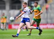28 June 2025; Kieran Duffy of Monaghan in action against Conor O'Donnell of Donegal during the GAA Football All-Ireland Senior Championship quarter-final match between Monaghan and Donegal at Croke Park in Dublin. Photo by Piaras Ó Mídheach/Sportsfile