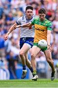 28 June 2025; Conor O'Donnell of Donegal gets away from Gary Mohan of Monaghan during the GAA Football All-Ireland Senior Championship quarter-final match between Monaghan and Donegal at Croke Park in Dublin. Photo by Piaras Ó Mídheach/Sportsfile