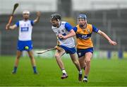 28 June 2025; Jamie Shanahan of Waterford is tackled by Colm Daly of Clare during the Electric Ireland GAA Hurling All-Ireland Minor Championship final match between Waterford and Clare at FBD Semple Stadium in Thurles, Tipperary. Photo by Brendan Moran/Sportsfile