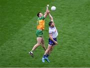 28 June 2025; Andrew Woods of Monaghan in action against Jason McGee of Donegal during the GAA Football All-Ireland Senior Championship quarter-final match between Monaghan and Donegal at Croke Park in Dublin. Photo by Daire Brennan/Sportsfile