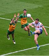 28 June 2025; Andrew Woods of Monaghan in action against Eoghan Bán Gallagher of Donegal during the GAA Football All-Ireland Senior Championship quarter-final match between Monaghan and Donegal at Croke Park in Dublin. Photo by Daire Brennan/Sportsfile