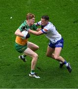 28 June 2025; Ciarán Moore of Donegal in action against Ryan Wylie of Monaghan during the GAA Football All-Ireland Senior Championship quarter-final match between Monaghan and Donegal at Croke Park in Dublin. Photo by Daire Brennan/Sportsfile