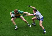 28 June 2025; Ciarán Moore of Donegal in action against Ryan Wylie of Monaghan during the GAA Football All-Ireland Senior Championship quarter-final match between Monaghan and Donegal at Croke Park in Dublin. Photo by Daire Brennan/Sportsfile