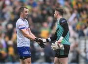 28 June 2025; Jack McCarron of Monaghan with Donegal goalkeeper Shaun Patton after the GAA Football All-Ireland Senior Championship quarter-final match between Monaghan and Donegal at Croke Park in Dublin. Photo by Ray McManus/Sportsfile