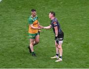 28 June 2025; Monaghan goalkeeper Rory Beggan shakes hands with Patrick McBrearty of Donegal after the GAA Football All-Ireland Senior Championship quarter-final match between Monaghan and Donegal at Croke Park in Dublin. Photo by Daire Brennan/Sportsfile