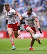 28 June 2025; Mattie Donnelly of Tyrone, supported by team-mate Peter Harte, left, during the GAA Football All-Ireland Senior Championship quarter-final match between Dublin and Tyrone at Croke Park in Dublin. Photo by Piaras Ó Mídheach/Sportsfile