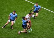 28 June 2025; Darragh Canavan of Tyrone in action against Lee Gannon of Dublin during the GAA Football All-Ireland Senior Championship quarter-final match between Dublin and Tyrone at Croke Park in Dublin. Photo by Daire Brennan/Sportsfile