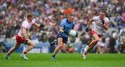 28 June 2025; Ciarán Kilkenny of Dublin in action against Peter Harte, left, and Conn Kilpatrick of Tyrone during the GAA Football All-Ireland Senior Championship quarter-final match between Dublin and Tyrone at Croke Park in Dublin. Photo by Ray McManus/Sportsfile