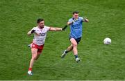 28 June 2025; Cormac Costello of Dublin in action against Pádraig Hampsey of Tyrone during the GAA Football All-Ireland Senior Championship quarter-final match between Dublin and Tyrone at Croke Park in Dublin. Photo by Daire Brennan/Sportsfile
