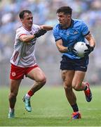 28 June 2025; David Byrne of Dublin in action against Darragh Canavan of Tyrone during the GAA Football All-Ireland Senior Championship quarter-final match between Dublin and Tyrone at Croke Park in Dublin. Photo by Piaras Ó Mídheach/Sportsfile