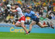 28 June 2025; Peter Teague of Tyrone in action against Brian O'Leary of Dublin during the GAA Football All-Ireland Senior Championship quarter-final match between Dublin and Tyrone at Croke Park in Dublin. Photo by Ray McManus/Sportsfile