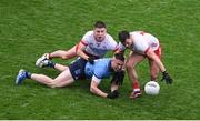 28 June 2025; Paddy Small of Dublin in action against Niall Devlin, left, and Darren McCurry of Tyrone during the GAA Football All-Ireland Senior Championship quarter-final match between Dublin and Tyrone at Croke Park in Dublin. Photo by Daire Brennan/Sportsfile
