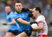 28 June 2025; Darragh Canavan of Tyrone in action against Eoin Murchan of Dublin during the GAA Football All-Ireland Senior Championship quarter-final match between Dublin and Tyrone at Croke Park in Dublin. Photo by David Fitzgerald/Sportsfile