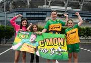 28 June 2025; Donegal supporters, from Burt, Co Donegal, left to right, Brianna McDermott, aged 9, Kayla McDermott, aged 6, Enya McDermott, aged 12, and Molly Flaherty, aged 8, with a banner for their teacher, Oisín Gallen, ahead of the GAA Football All-Ireland Senior Championship quarter-final match between Monaghan and Donegal at Croke Park in Dublin. Photo by Daire Brennan/Sportsfile