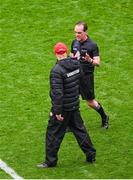 28 June 2025; Tyrone manager Malachy O'Rourke speaks with referee David Coldrick at half-time of the GAA Football All-Ireland Senior Championship quarter-final match between Dublin and Tyrone at Croke Park in Dublin. Photo by Daire Brennan/Sportsfile