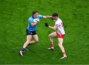 28 June 2025; Brian Howard of Dublin in action against Ciarán Daly of Tyrone during the GAA Football All-Ireland Senior Championship quarter-final match between Dublin and Tyrone at Croke Park in Dublin. Photo by Daire Brennan/Sportsfile