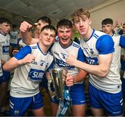 28 June 2025; Waterford players, from left, Darragh Keane, Daragh Murphy and Conor Lynch celebrate with the Irish Press Cup after the Electric Ireland GAA Hurling All-Ireland Minor Championship final match between Waterford and Clare at FBD Semple Stadium in Thurles, Tipperary. Photo by Brendan Moran/Sportsfile