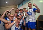 28 June 2025; Waterford players celebrate with the Irish Press Cup after the Electric Ireland GAA Hurling All-Ireland Minor Championship final match between Waterford and Clare at FBD Semple Stadium in Thurles, Tipperary. Photo by Brendan Moran/Sportsfile