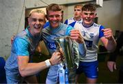 28 June 2025; Waterford players, from left, captain James Comerford, Darragh Duffy and Daragh Murphy celebrate with the Irish Press Cup after the Electric Ireland GAA Hurling All-Ireland Minor Championship final match between Waterford and Clare at FBD Semple Stadium in Thurles, Tipperary. Photo by Brendan Moran/Sportsfile