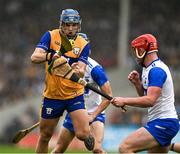 28 June 2025; Paul Rodgers of Clare in action against Daragh Murphy of Waterford during the Electric Ireland GAA Hurling All-Ireland Minor Championship final match between Waterford and Clare at FBD Semple Stadium in Thurles, Tipperary. Photo by Brendan Moran/Sportsfile