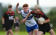 28 June 2025; Sean Birt of Lavey in action against Dara Doonan of Ballinderry during the Football Division 1 Shield Final match between Lavey and Ballinderry at the John West Féile Peile na nÓg Gaelic Football and LGFA National Finals at Derry GAA Centre of Excellence in Owenbeg, Derry. Photo by Shauna Clinton/Sportsfile