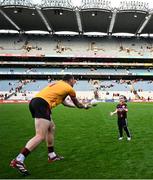 28 June 2025; Tyrone goalkeeper Niall Morgan with his daughter Maisie, age 4, after the GAA Football All-Ireland Senior Championship quarter-final match between Dublin and Tyrone at Croke Park in Dublin. Photo by David Fitzgerald/Sportsfile
