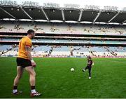 28 June 2025; Tyrone goalkeeper Niall Morgan with his daughter Maisie, age 4, after the GAA Football All-Ireland Senior Championship quarter-final match between Dublin and Tyrone at Croke Park in Dublin. Photo by David Fitzgerald/Sportsfile
