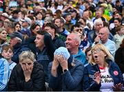 28 June 2025; Dublin supporters and a Tyrone supporter react after Dublin goalkeeper Stephen Cluxton missed a free after the GAA Football All-Ireland Senior Championship quarter-final match between Dublin and Tyrone at Croke Park in Dublin. Photo by David Fitzgerald/Sportsfile