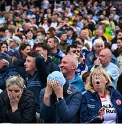 28 June 2025; Dublin supporters and a Tyrone supporter react after Dublin goalkeeper Stephen Cluxton missed a free after the GAA Football All-Ireland Senior Championship quarter-final match between Dublin and Tyrone at Croke Park in Dublin. Photo by David Fitzgerald/Sportsfile
