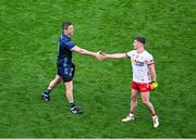 28 June 2025; Dublin goalkeeper Stephen Cluxton shakes hands with Ruairí Canavan of Tyrone after the GAA Football All-Ireland Senior Championship quarter-final match between Dublin and Tyrone at Croke Park in Dublin. Photo by Daire Brennan/Sportsfile