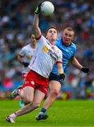 28 June 2025; Eoin McElholm of Tyrone in action against Ciarán Kilkenny of Dublin during the GAA Football All-Ireland Senior Championship quarter-final match between Dublin and Tyrone at Croke Park in Dublin. Photo by Ray McManus/Sportsfile