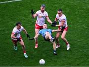 28 June 2025; Eoin Murchan of Dublin in action against Tyrone players, left to right, Darragh Canavan, Mattie Donnelly, and Conn Kilpatrick during the GAA Football All-Ireland Senior Championship quarter-final match between Dublin and Tyrone at Croke Park in Dublin. Photo by Daire Brennan/Sportsfile