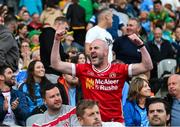 28 June 2025; Tyrone supporters celebrate during the GAA Football All-Ireland Senior Championship quarter-final match between Dublin and Tyrone at Croke Park in Dublin. Photo by David Fitzgerald/Sportsfile
