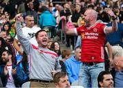28 June 2025; Tyrone supporters celebrate during the GAA Football All-Ireland Senior Championship quarter-final match between Dublin and Tyrone at Croke Park in Dublin. Photo by David Fitzgerald/Sportsfile