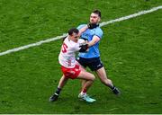 28 June 2025; Darragh Canavan of Tyrone in action against Seán MacMahon of Dublin during the GAA Football All-Ireland Senior Championship quarter-final match between Dublin and Tyrone at Croke Park in Dublin. Photo by Daire Brennan/Sportsfile