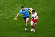 28 June 2025; Aidan Clarke of Tyrone in action against Cormac Costello of Dublin during the GAA Football All-Ireland Senior Championship quarter-final match between Dublin and Tyrone at Croke Park in Dublin. Photo by Daire Brennan/Sportsfile