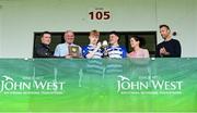 28 June 2025; Naas captains Oisin Lynch, left, and Matthew McCarthy are presented with the cup after their side's victory in the Football Division 1 Cup Final match between Naas and New York at the John West Féile Peile na nÓg Gaelic Football and LGFA National Finals at Derry GAA Centre of Excellence in Owenbeg, Derry. Photo by Shauna Clinton/Sportsfile