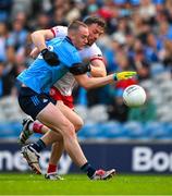 28 June 2025; Peadar Ó Cofaigh Byrne of Dublin in action against Brian Kennedy of Tyrone during the GAA Football All-Ireland Senior Championship quarter-final match between Dublin and Tyrone at Croke Park in Dublin. Photo by Ray McManus/Sportsfile