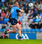 28 June 2025; Peadar Ó Cofaigh Byrne of Dublin in action against Brian Kennedy of Tyrone during the GAA Football All-Ireland Senior Championship quarter-final match between Dublin and Tyrone at Croke Park in Dublin. Photo by Ray McManus/Sportsfile