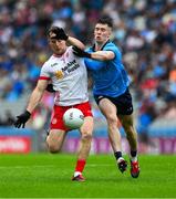 28 June 2025; Kieran McGeary of Tyrone in action against Lee Gannon of Dublin during the GAA Football All-Ireland Senior Championship quarter-final match between Dublin and Tyrone at Croke Park in Dublin. Photo by Ray McManus/Sportsfile