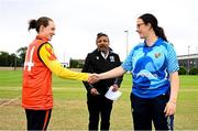 29 June 2025; Scorchers captain Christina Coulter Reilly, left, and Typhoons captain Jane Maguire shake hands before the Evoke Super 20 Trophy match between Typhoons and Scorchers at Railway Union Cricket Club in Dublin. Photo by Seb Daly/Sportsfile