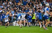 28 June 2025; Supporters run onto the pitch before the final whistle is blown in the Electric Ireland GAA Hurling All-Ireland Minor Championship final match between Waterford and Clare at FBD Semple Stadium in Thurles, Tipperary. Photo by Brendan Moran/Sportsfile