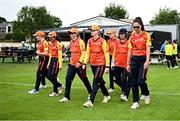 29 June 2025; Scorchers players before the Evoke Super 20 Trophy match between Typhoons and Scorchers at Railway Union Cricket Club in Dublin. Photo by Seb Daly/Sportsfile