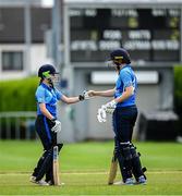 29 June 2025; Typhoons batters Alice Walsh, left, and Rebecca Stokell during the Evoke Super 20 Trophy match between Typhoons and Scorchers at Railway Union Cricket Club in Dublin. Photo by Seb Daly/Sportsfile
