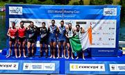 29 June 2025; Konan Pazzala, second from right, and Fintan McCarthy of Ireland celebrate on the podium after finishing third in the Men's Double Scull Final A during the 2025 World Rowing Cup at Rotsee in Lucerne, Switzerland. Photo by Benedict Tufnell/Sportsfile