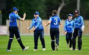 29 June 2025; Typhoons players Rebecca Stokell and Freya Sargent celebrate a wicket during the Evoke Super 20 Trophy match between Typhoons and Scorchers at Railway Union Cricket Club in Dublin. Photo by Seb Daly/Sportsfile