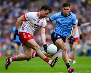 28 June 2025; Darren McCurry of Tyrone with David Byrne of Dublin in persuit during the GAA Football All-Ireland Senior Championship quarter-final match between Dublin and Tyrone at Croke Park in Dublin. Photo by Ray McManus/Sportsfile