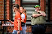 29 June 2025; A Kerry supporter looks on as two Armagh supporters walk by before the GAA Football All-Ireland Senior Championship quarter-final match between Armagh and Kerry at Croke Park in Dublin. Photo by Shauna Clinton/Sportsfile